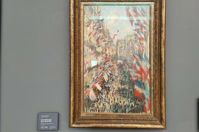 Eugene Tassart / Voyage10.com Monet's "Rue Montorgueil"